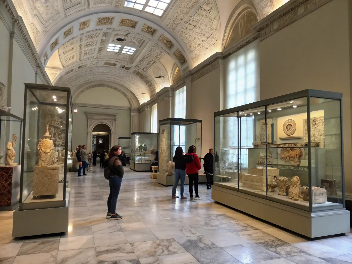 A photograph showcasing a collaborative exhibition between multiple museums in the Burgundy–Franche-Comté region, highlighting artifacts from different collections displayed together.